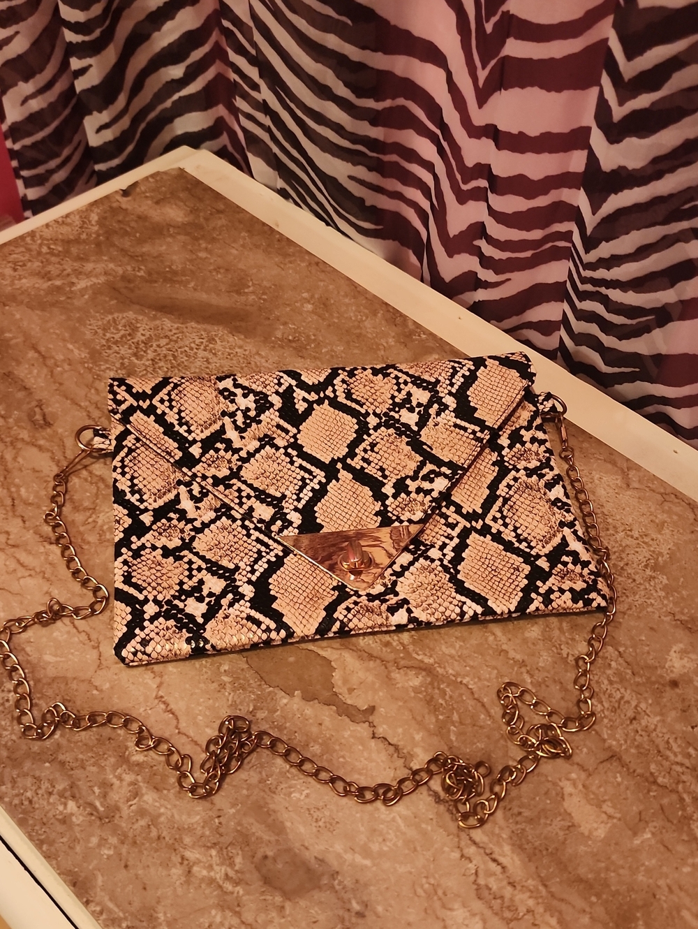 Snake-Print Envelope Crossbody Bag in Black & Cream